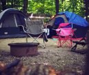 two pink and gray camping chairs