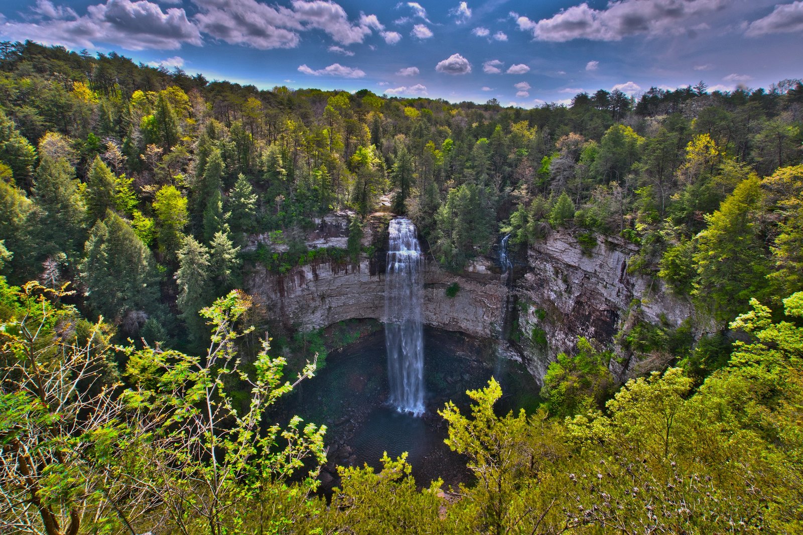 Fall Creek Falls viewed across its forested gorge above the Base Trail